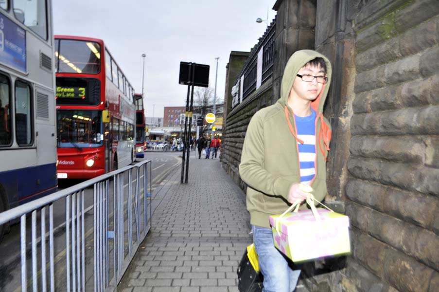 Man with a present, the Bull Ring.