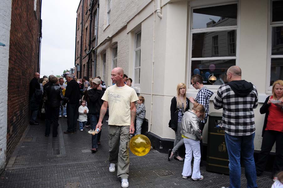 Man with a yellow balloon.