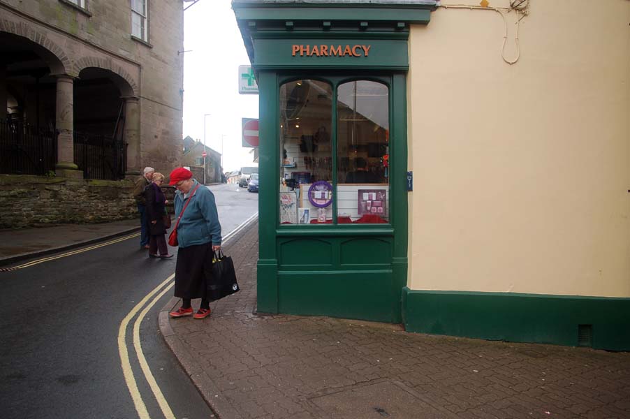 Lady in a red hat, Hay on Wye.