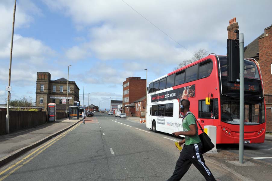 Man crossing the road, Dudley.