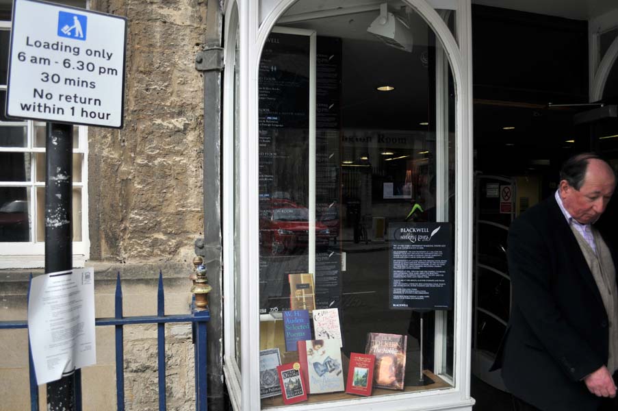 Man leaving a bookshop.