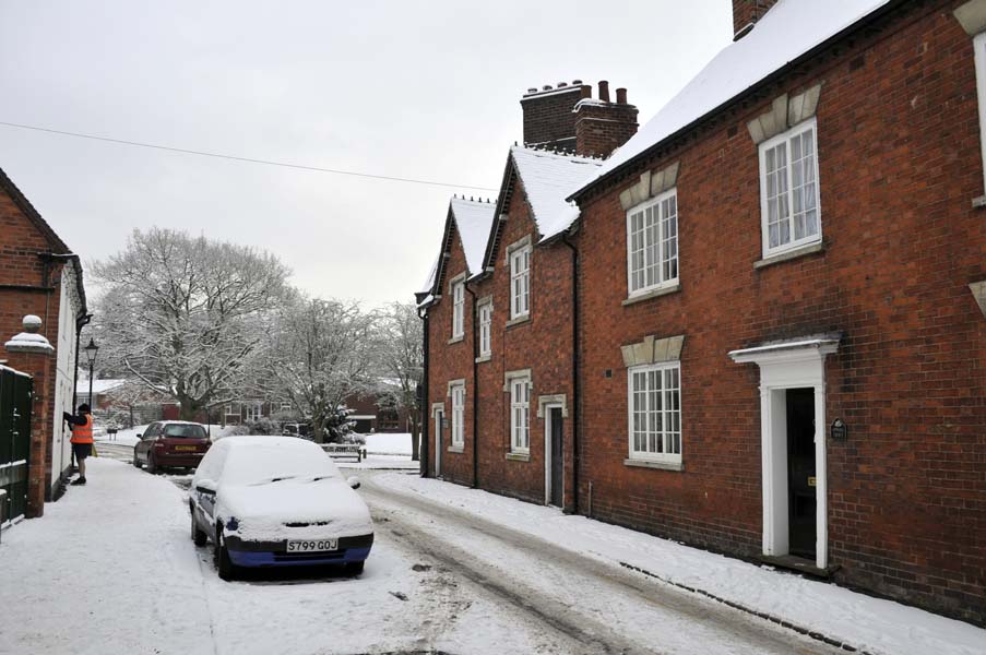 Postman in shorts, Berkswell.