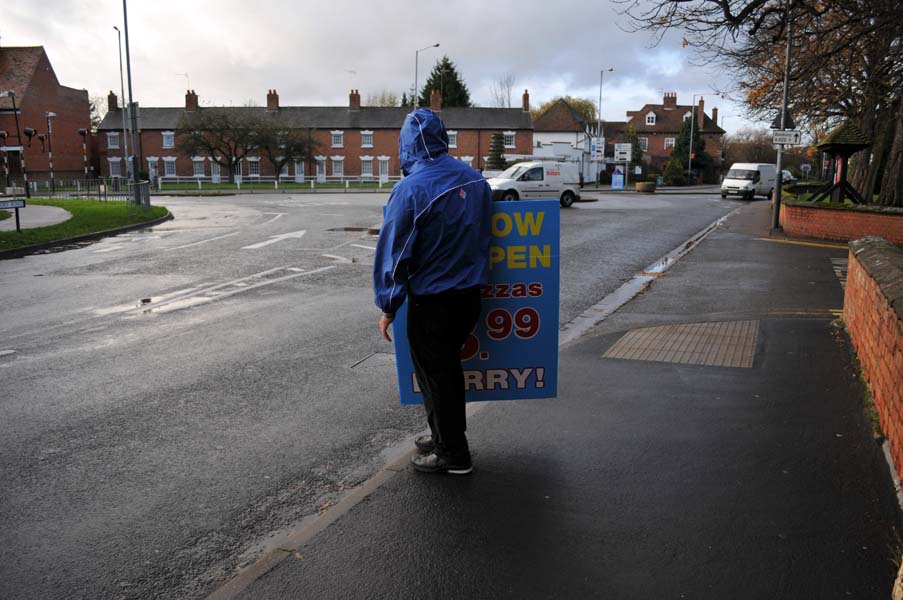 Man with a sign.